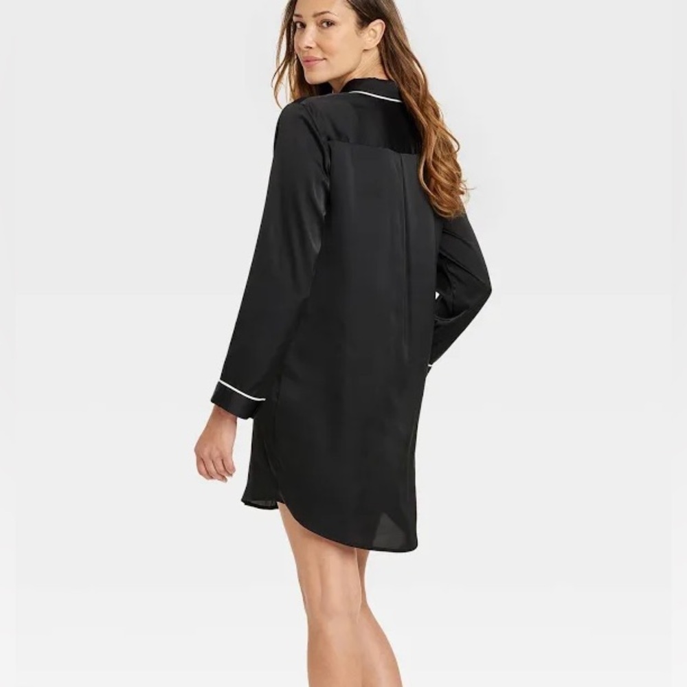 Stars above black silk nightgown